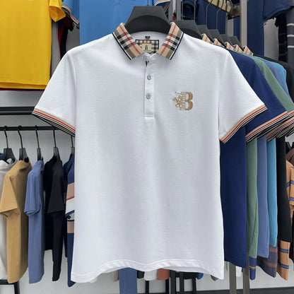 https://cdn.shopify.com/s/files/1/0807/0745/3272/files/Camisa-polo-de-algod-o-de-manga-curta-bordada-masculina-tops-de-lapela-empresarial-marca-de.jpg__1.webp?v=1724446480