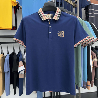 https://cdn.shopify.com/s/files/1/0807/0745/3272/files/Camisa-polo-de-algod-o-de-manga-curta-bordada-masculina-tops-de-lapela-empresarial-marca-de.jpg__3.webp?v=1724446479