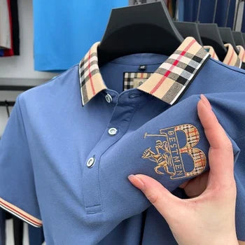 https://cdn.shopify.com/s/files/1/0807/0745/3272/files/High-end-short-sleeve-men-s-breathable-cotton-POLO-shirt-summer-fashion-brand-B-letter-embroidered_jpg_350x350xz_jpg.webp?v=1724446477
