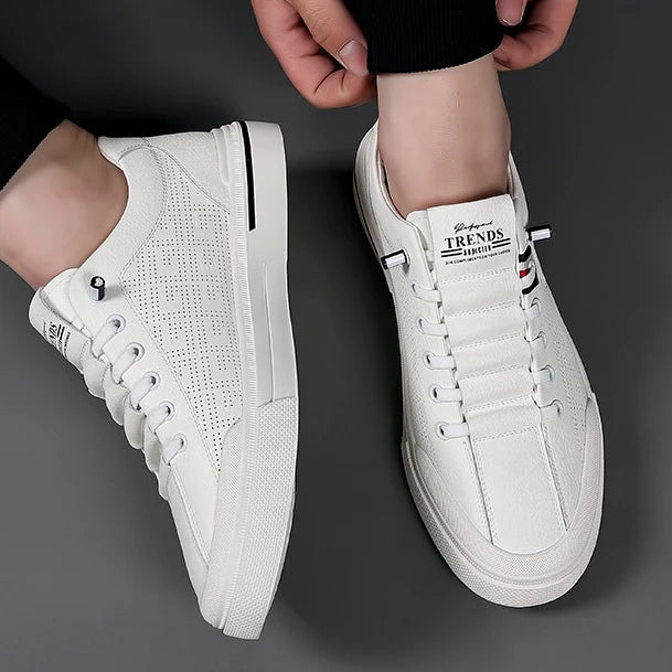 https://cdn.shopify.com/s/files/1/0807/0745/3272/products/Sapatilhas-de-tamanho-vulcanizado-respir-vel-masculinas-vers-til-pequeno-branco-ver-o-novo-sapatilhas-2023.jpg__1.jpg?v=1772537175