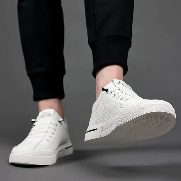 https://cdn.shopify.com/s/files/1/0807/0745/3272/products/Sapatilhas-de-tamanho-vulcanizado-respir-vel-masculinas-vers-til-pequeno-branco-ver-o-novo-sapatilhas-2023_jpg.webp?v=1772537175